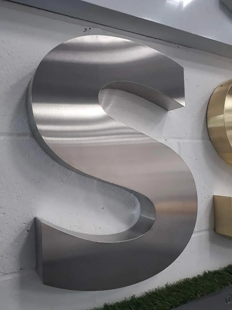 Letter S in brushed satin stainless steel
