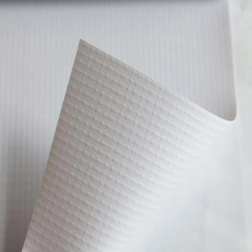 Rolled edge of a white PVC banner material