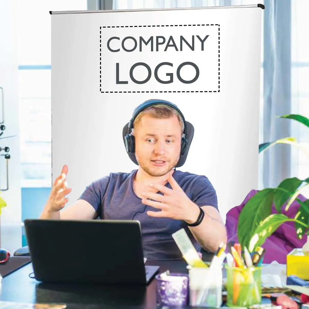 Branded privacy screen used as a backdrop behind a man on a video call