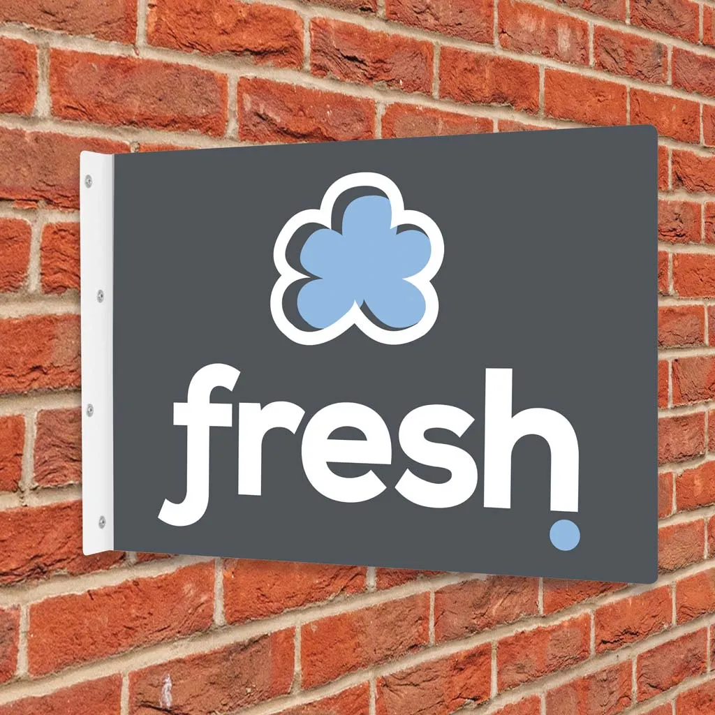 Rectangular Fresh projection sign fixed to a brick wall