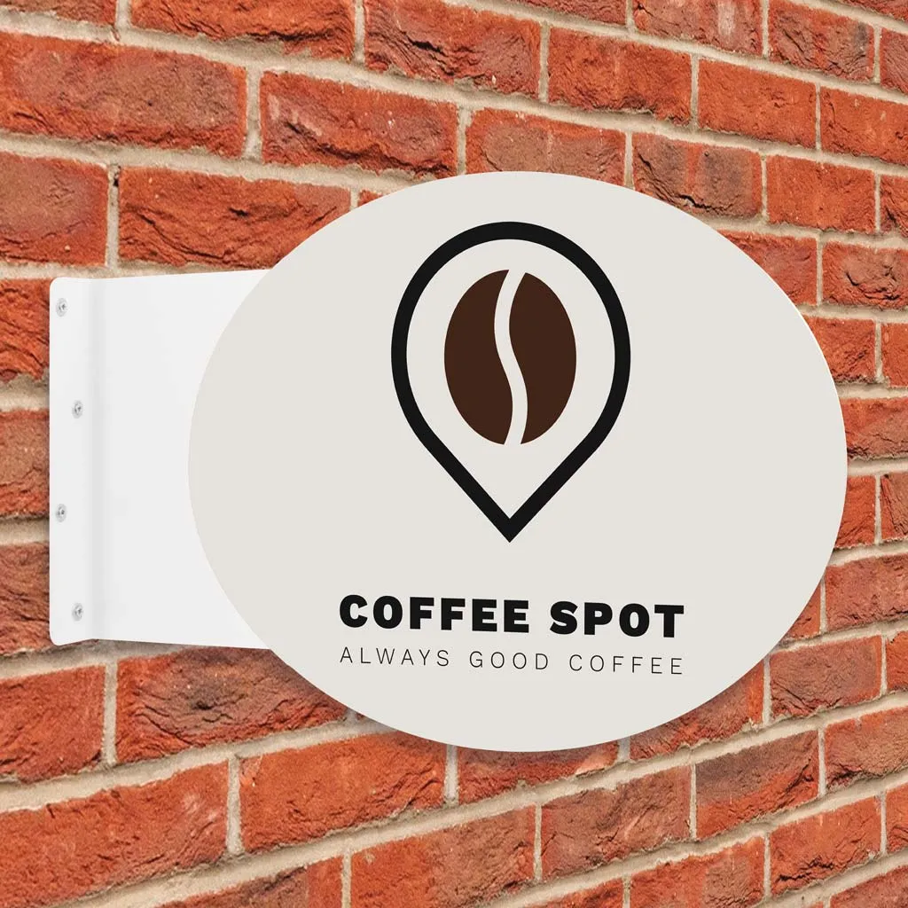 Oval Coffee Spot projection sign fixed to a brick wall