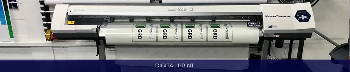 Wide format print and cut machine running full colour vinyl in the East Herts Signs studio