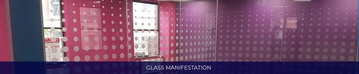 Office partitions and windows frosted with a dotted glass manifestation pattern